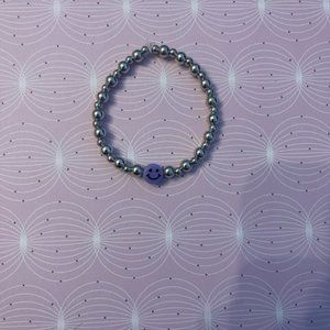 purple smiley bracelet